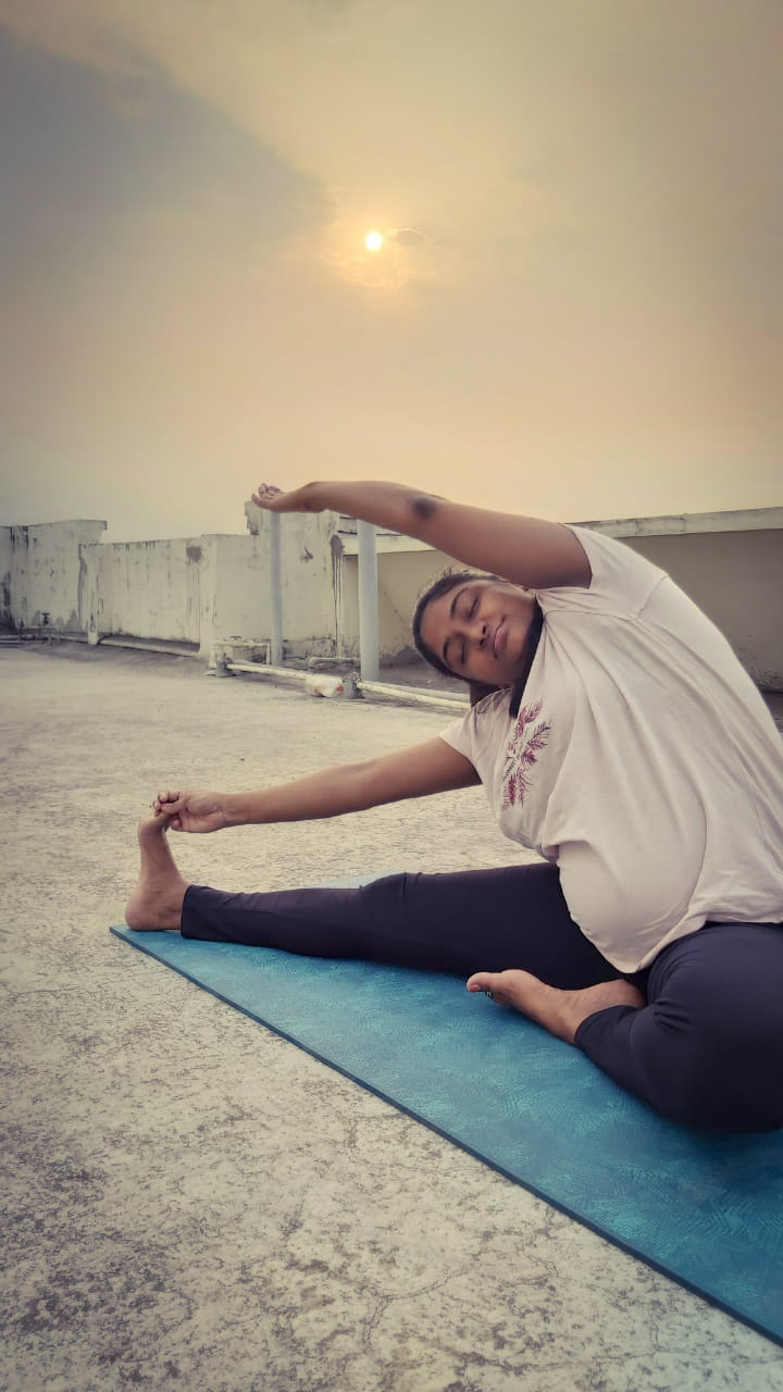 Sri Vaishnavi practicing yoga outdoors