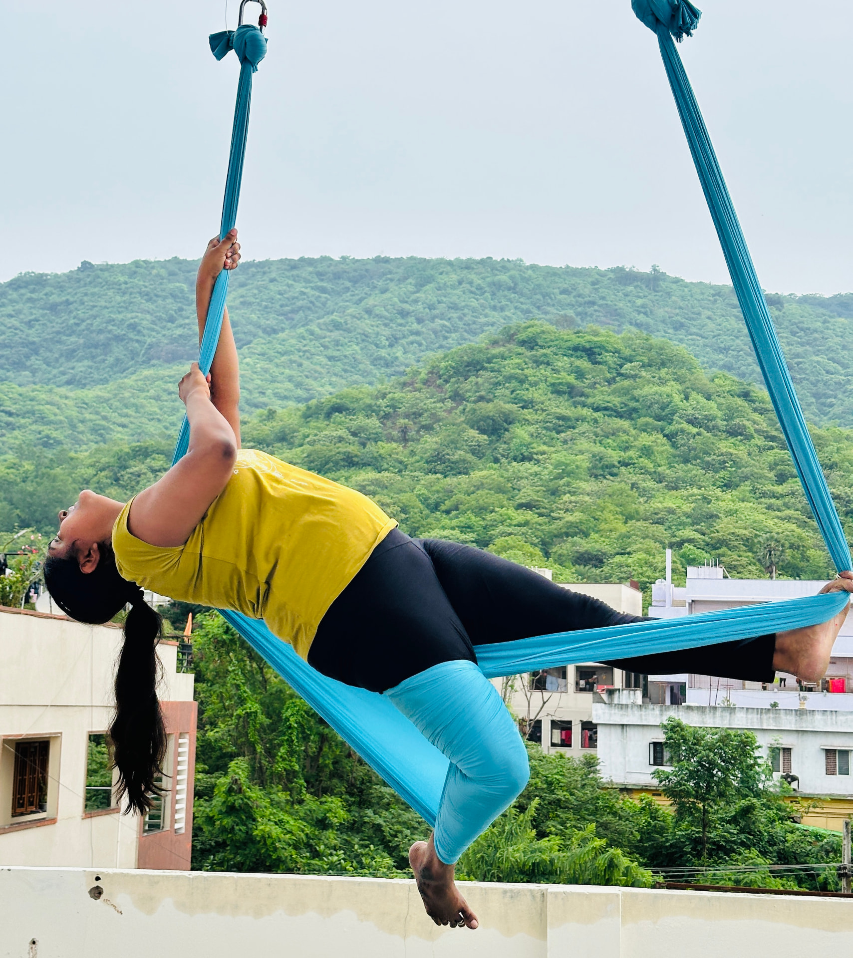 Sri Vaishnavi practicing aerial yoga